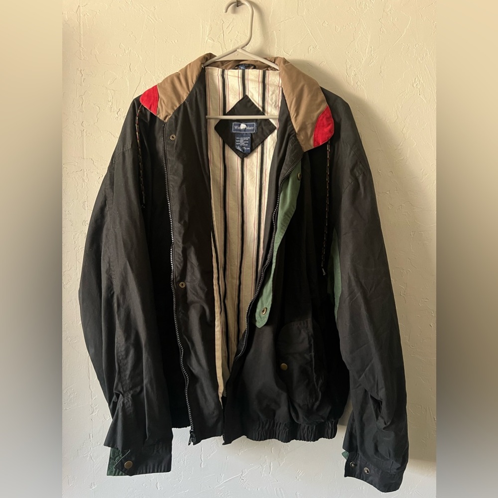 Men jacket with hoodie built into the neck collar